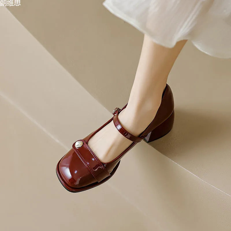 Apricot patent leather chunky heel pump with square toe and ankle buckle