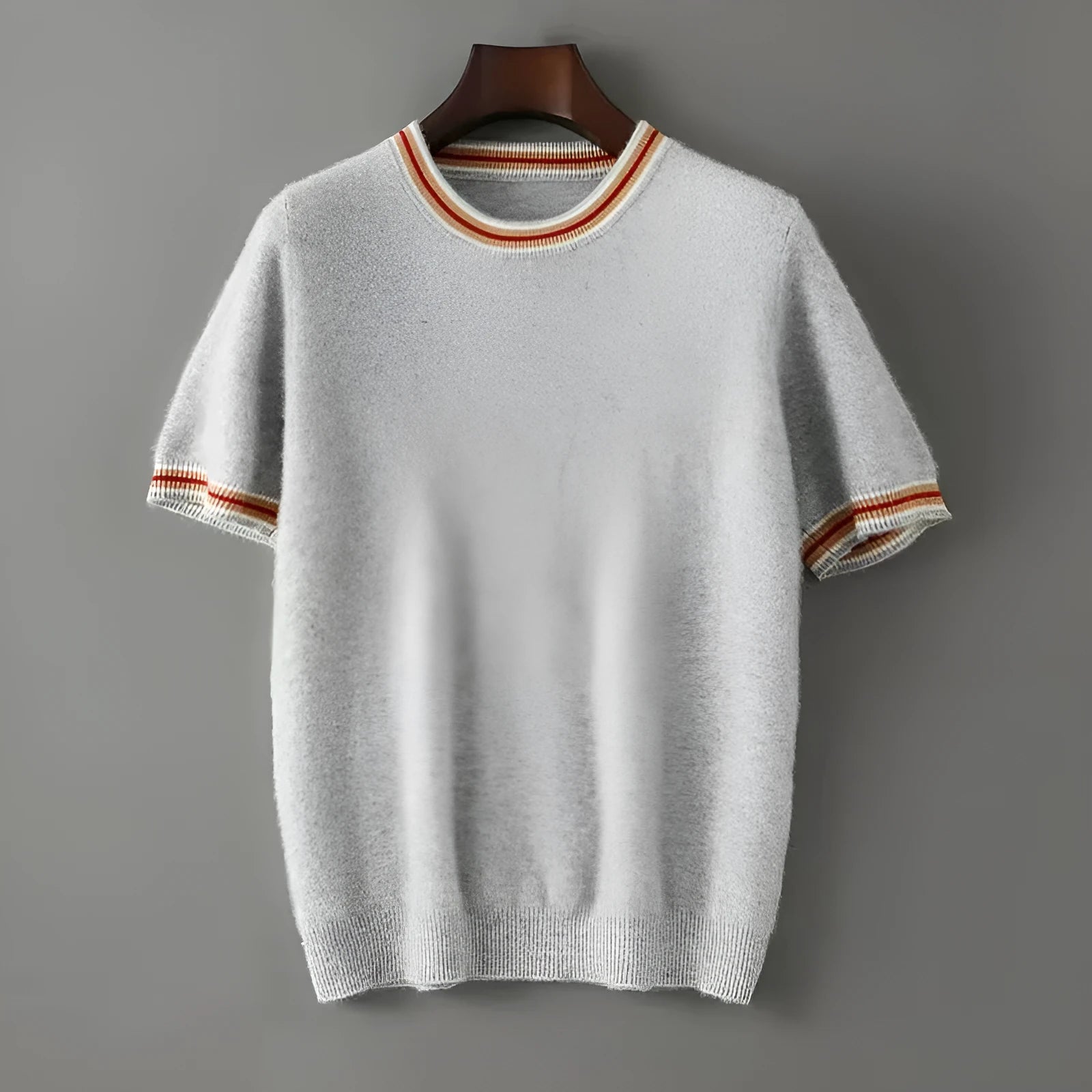 Men's round neck short sleeve pure wool sweater in black, shown on a hanger.