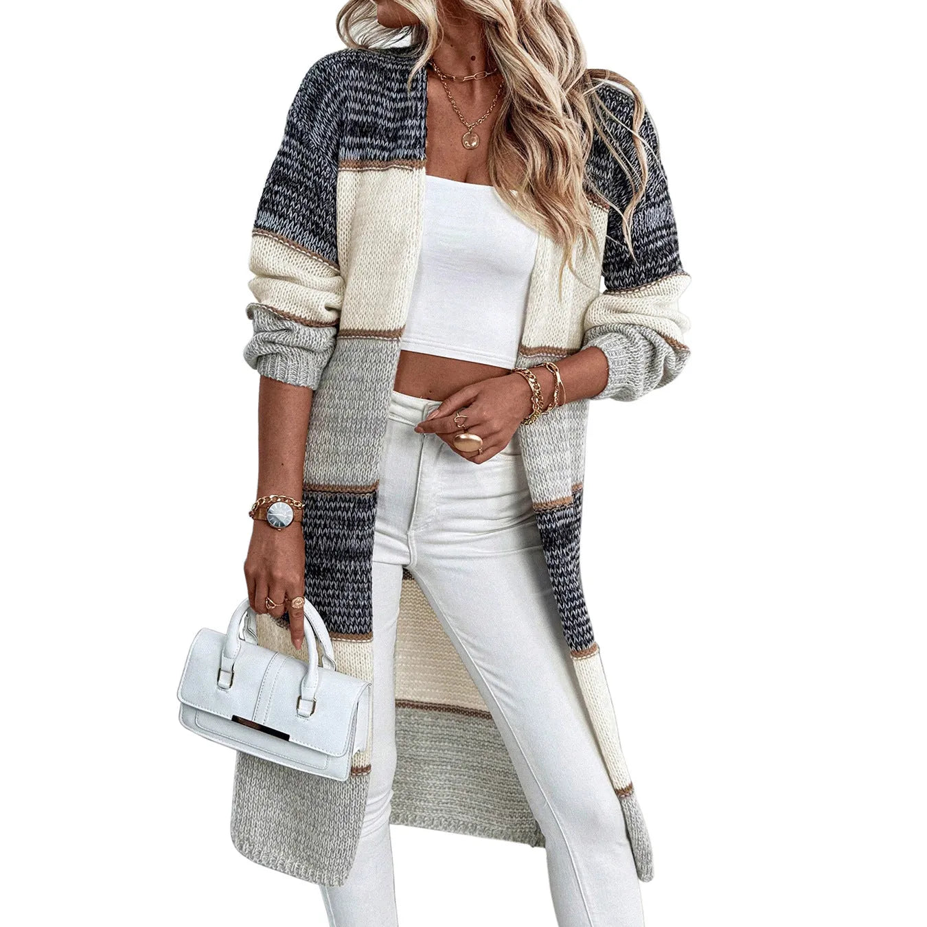 Grey women's knitted long cardigan with loose fit and long sleeves on a hanger.