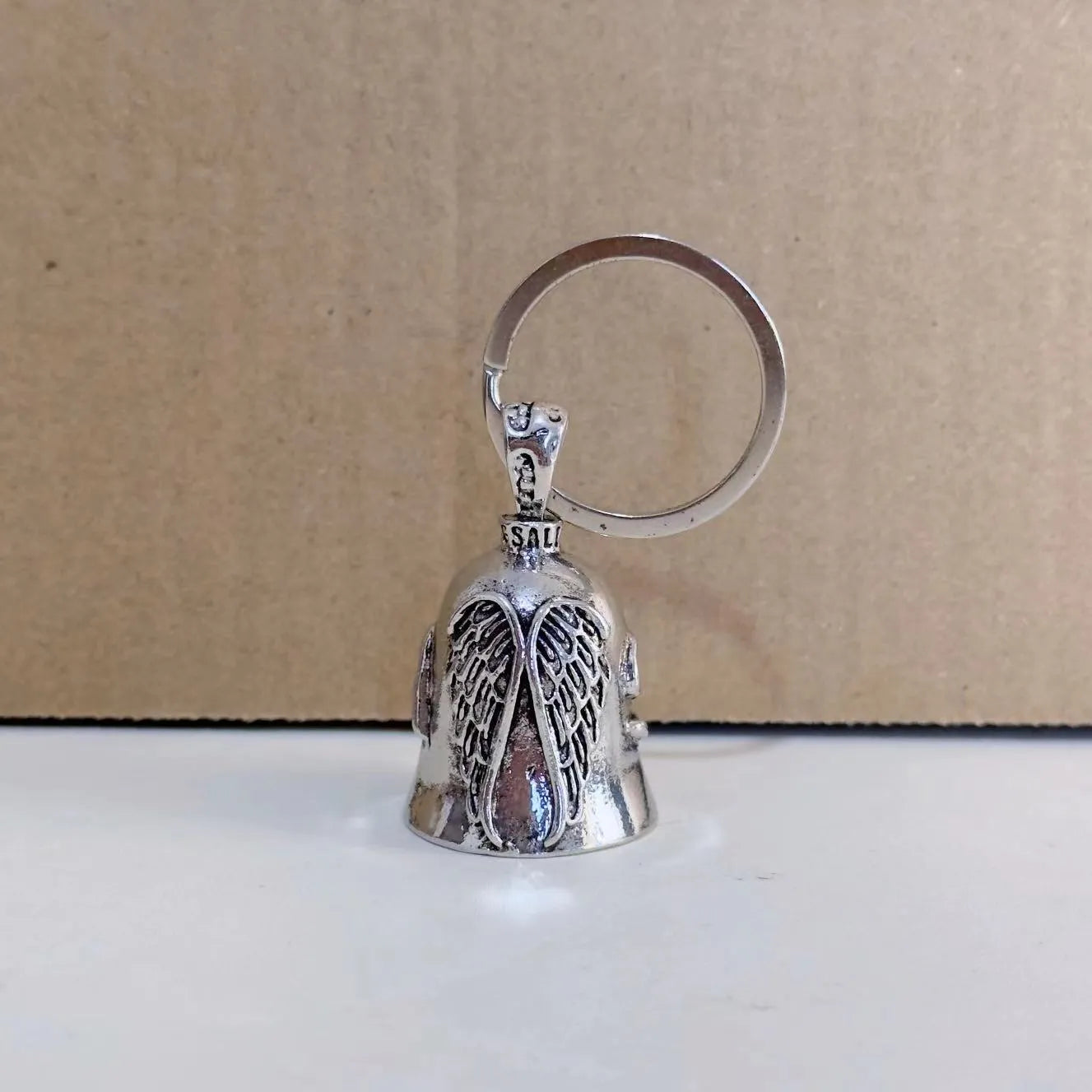 White vintage angel feather necklace and matching keychain set with electroplated alloy construction