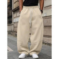 Men's straight-leg trousers in black colour with high waist and cropped length design