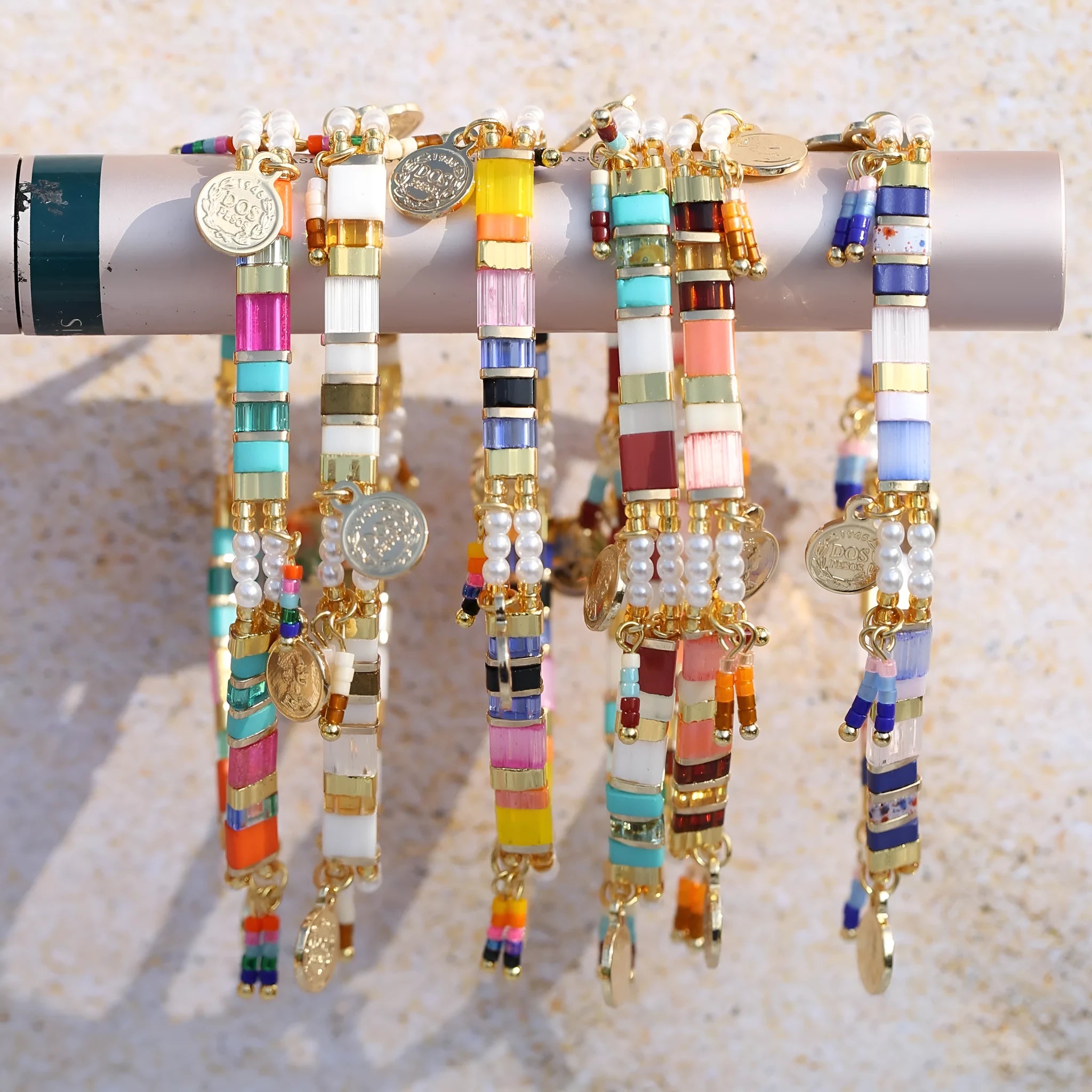 Women's handmade imitation pearl beaded bracelet with adjustable clasp in a choice of six colours.