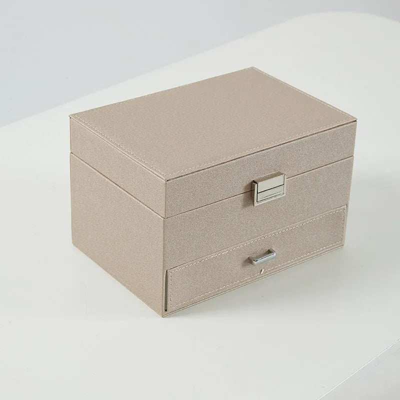 PU leather hard-shell jewellery storage box in rose gold colour