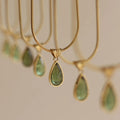 Retro water drop necklace with mixed gem inlaid pendant on titanium steel snake bone chain