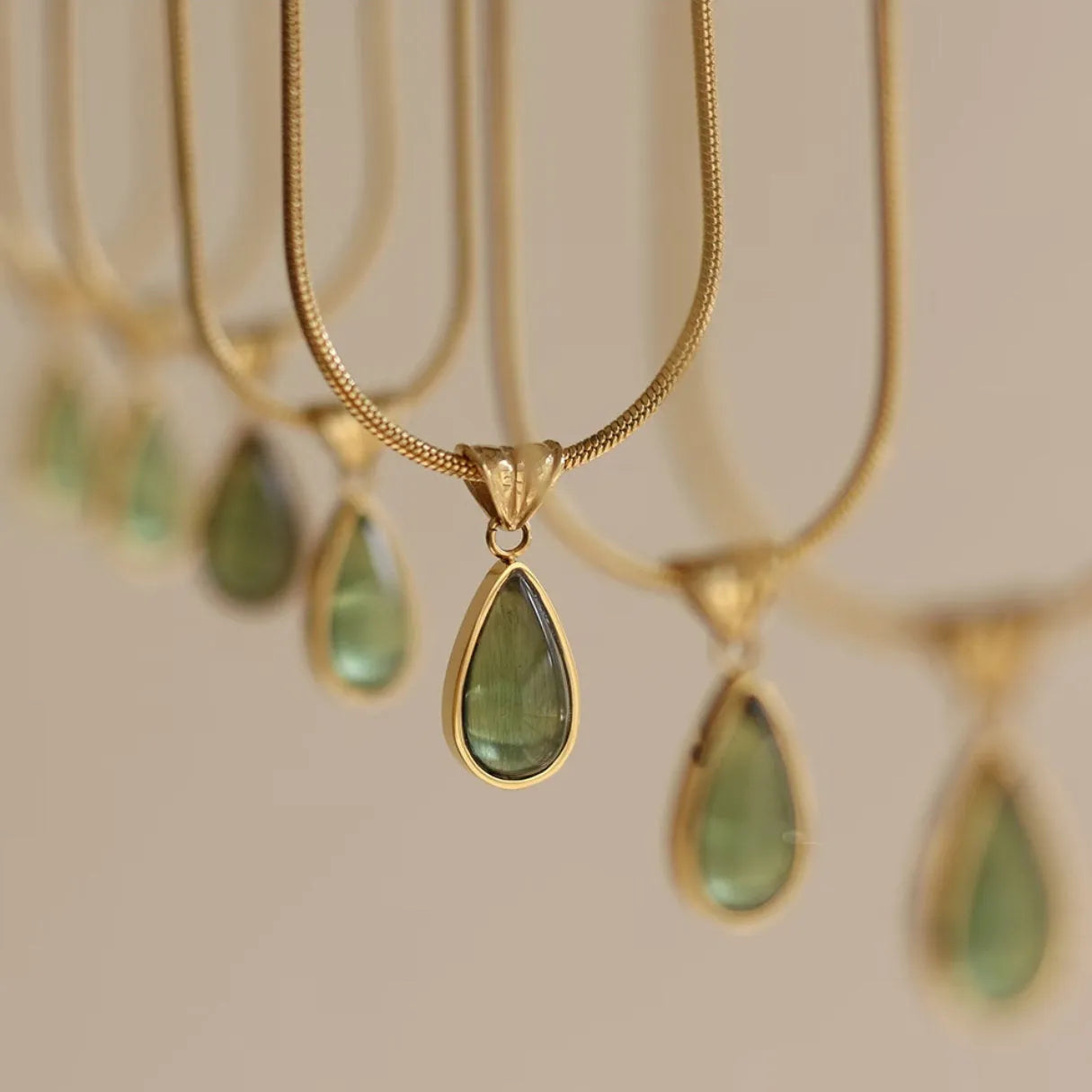 Retro water drop necklace with mixed gem inlaid pendant on titanium steel snake bone chain