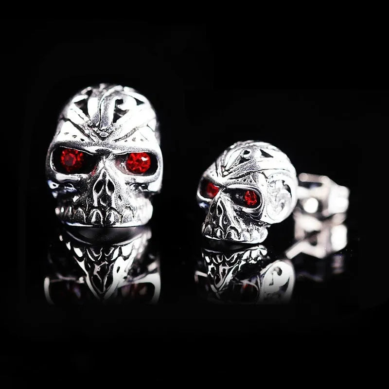 Retro skull stud earrings with red eye ghost head design and gemstone inlays on alloy base