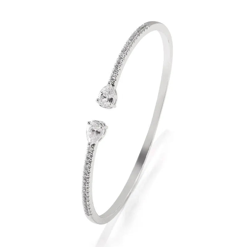 Multi-zircon personalised bracelet with inlaid stones on copper base in white and blue colour options