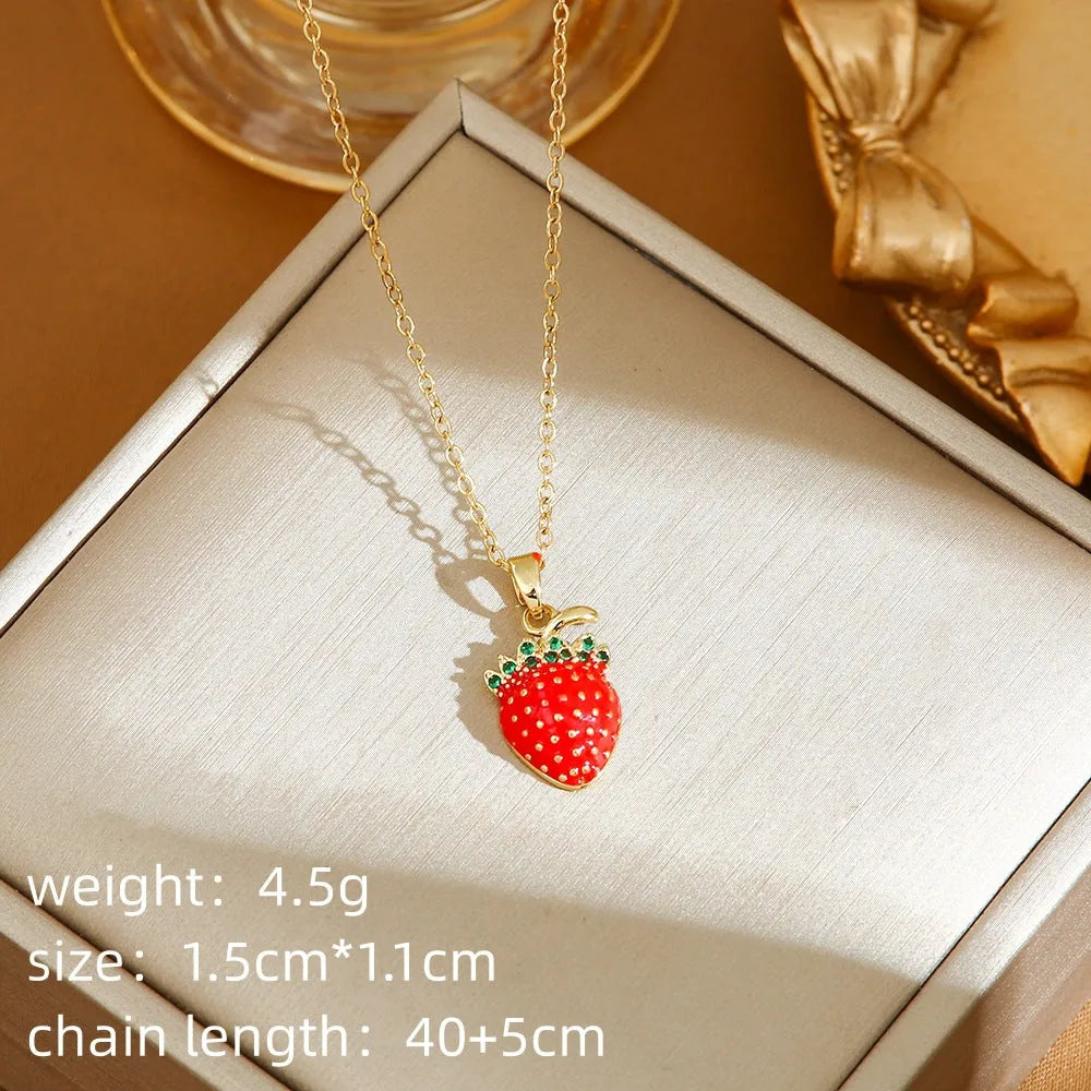 Delicate indie cherry strawberry pepper necklace on a titanium steel O-ring chain