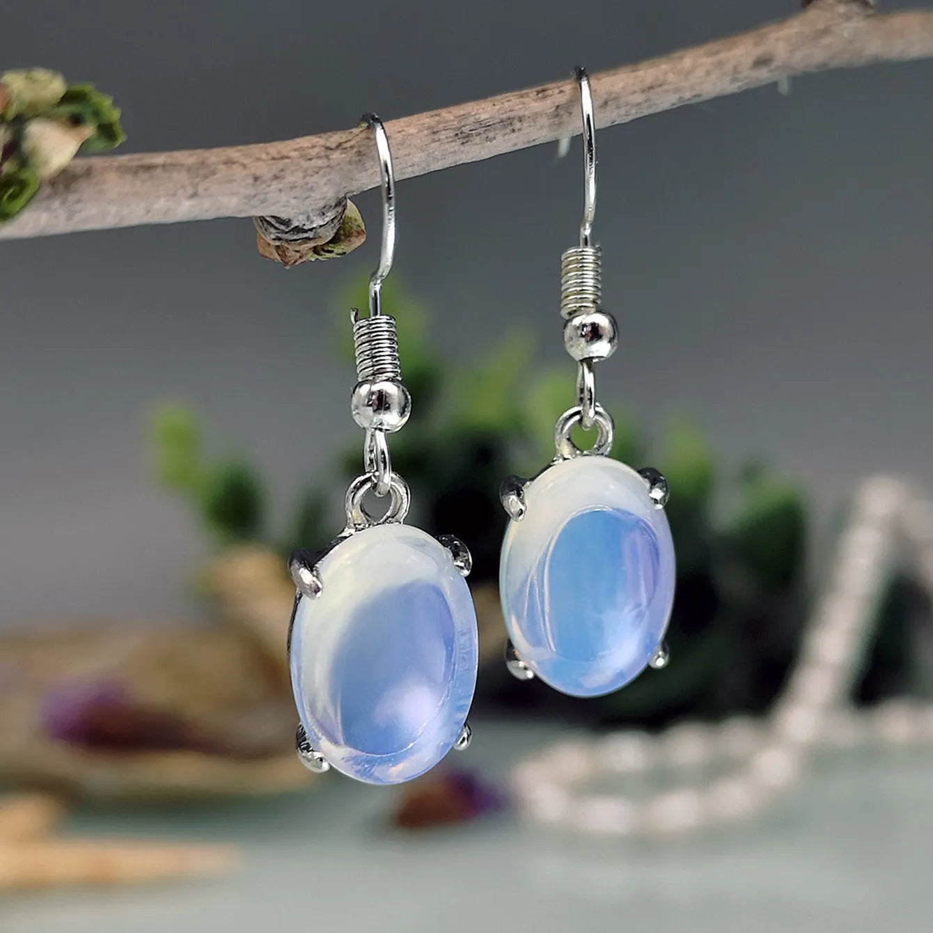 Moonlight white opal drop earrings with ellipse moonstone and retro cross design