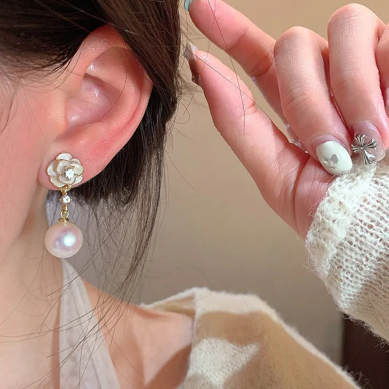 Camellia flower stud earrings with pearl centrepiece on alloy backing