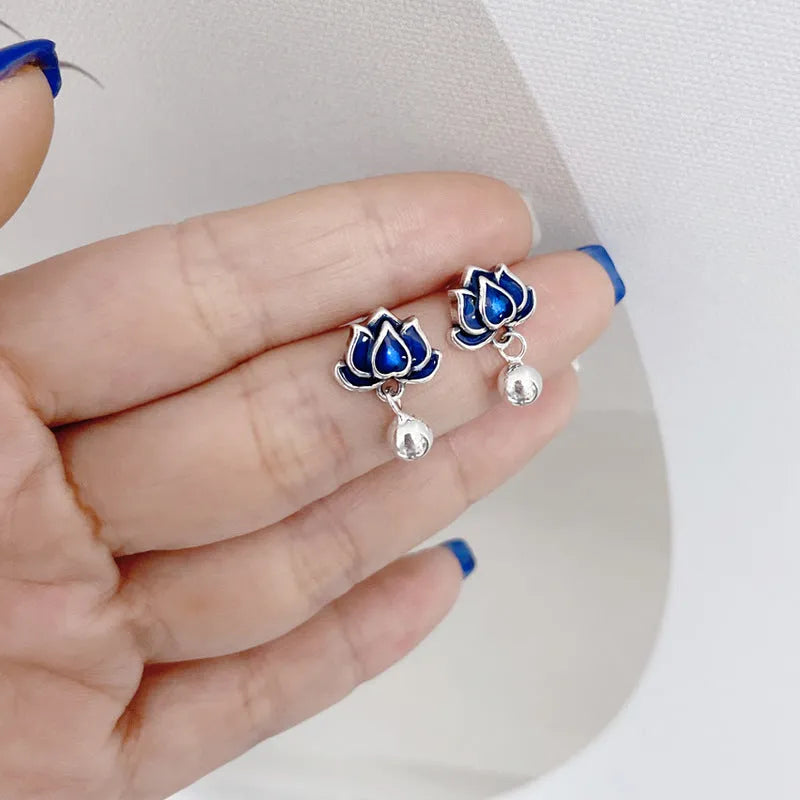 Silver Needle alloy lotus seedpod ear studs with tassel detail, 1.2cm wide.
