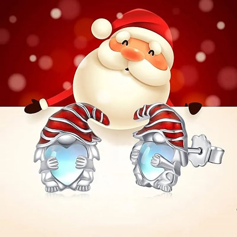 Women's cute Santa Claus design heart-shaped earrings in electroplated white gold colour.