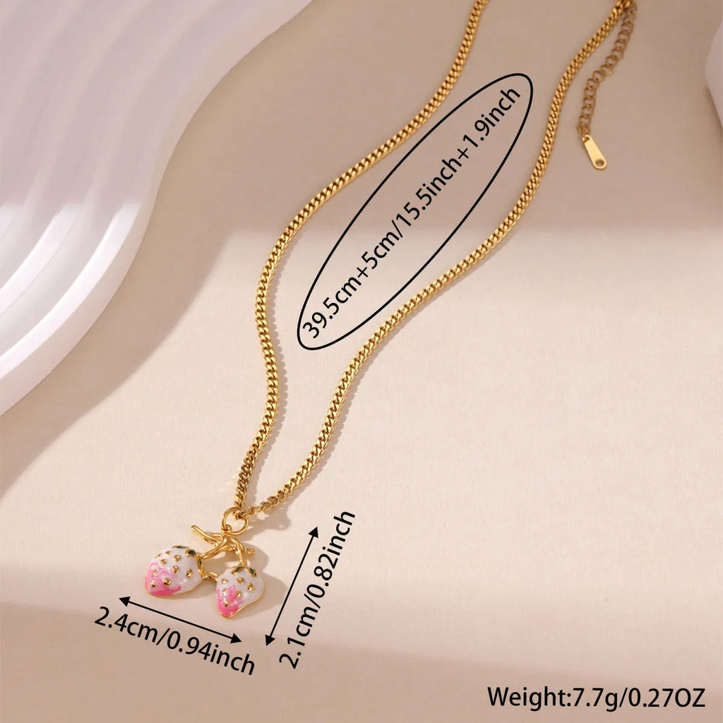 Women's strawberry-shaped alloy pendant necklace on a stainless steel chain in red or white powder gradient colour.