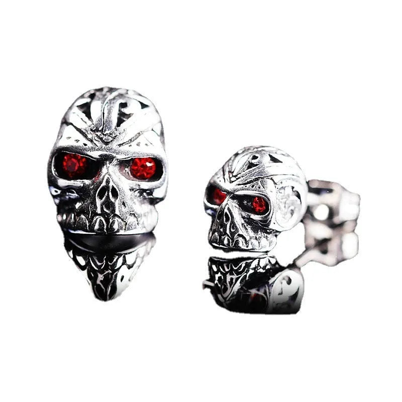 Retro skull stud earrings with red eye ghost head design and gemstone inlays on alloy base