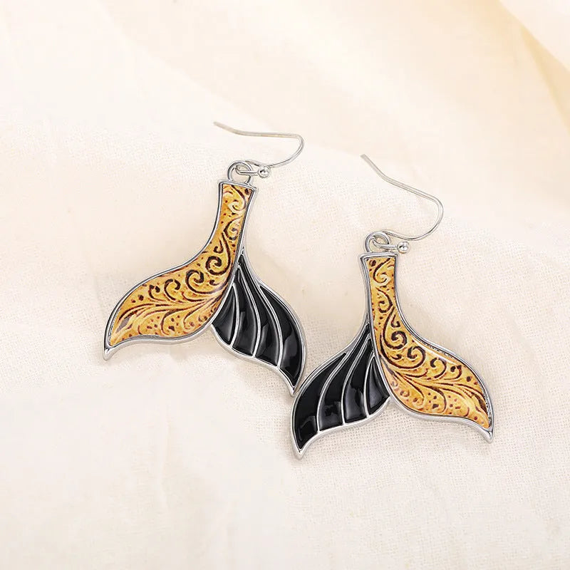 Women's retro fish tail earrings with whale design in white gold colour alloy