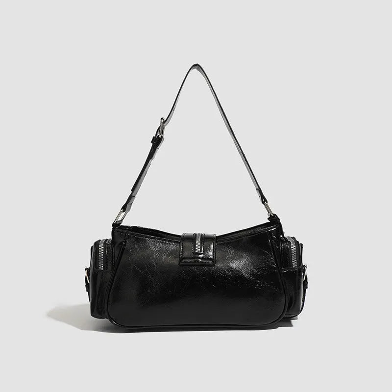 Black retro dumpling-shaped shoulder handbag with oil wax leather finish and external pocket