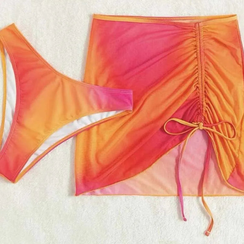 Women's orange and purple gradient three-piece swimsuit with adjustable loop buckle design