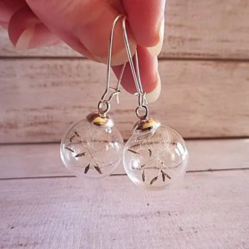 Transparent 16mm glass ball earrings with dandelion seed design on silver French hooks