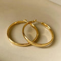 40mm circular metal earrings in gold and silver electroplated finishes