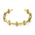 Close-up of stainless steel C-shaped textured bean beads in gold, steel, and steel-gold colours.