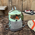 Japanese style casual backpack in lightweight nylon, showing curved shoulder straps and solid colour options.