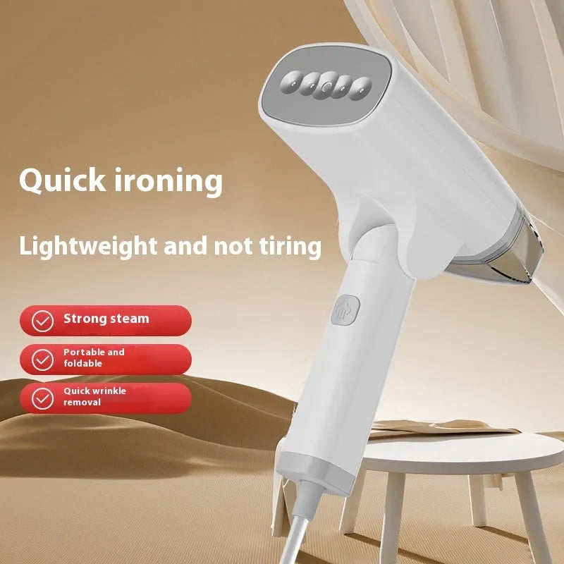 Blue handheld garment steamer with water tank and temperature controls for clothes steaming