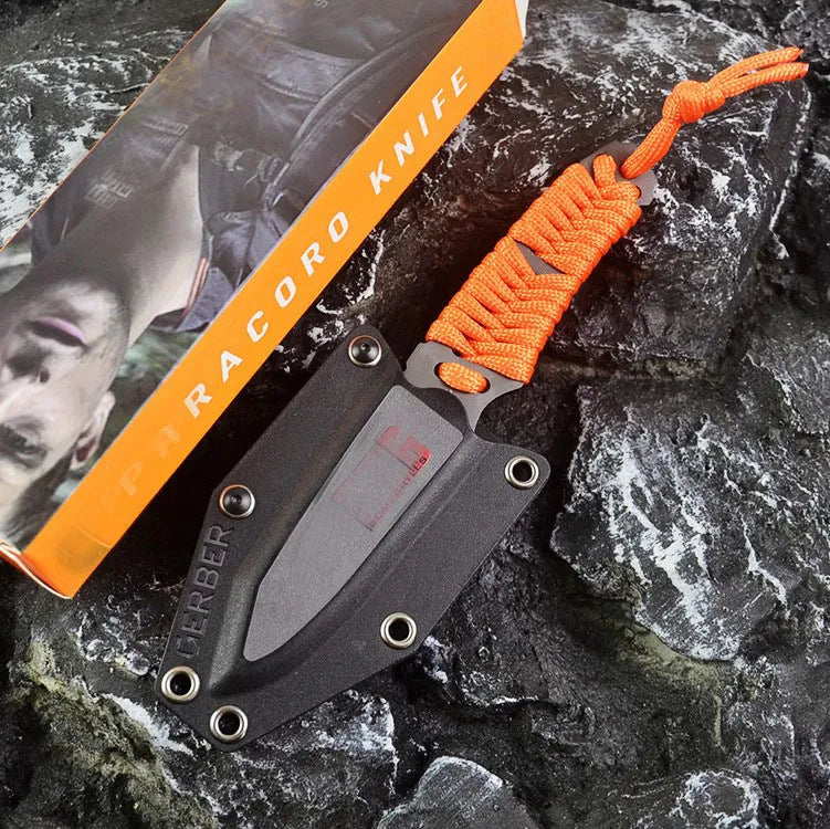 Multi-function survival knife with straight blade and rope handle showing ABS sheath