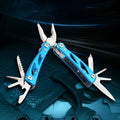 Compact blue folding multi-function pliers with a fruit knife on a white background, next to its Oxford storage bag.