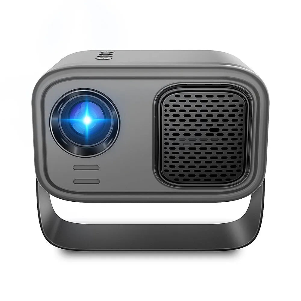 Black compact HD smart portable projector with remote control on a table.