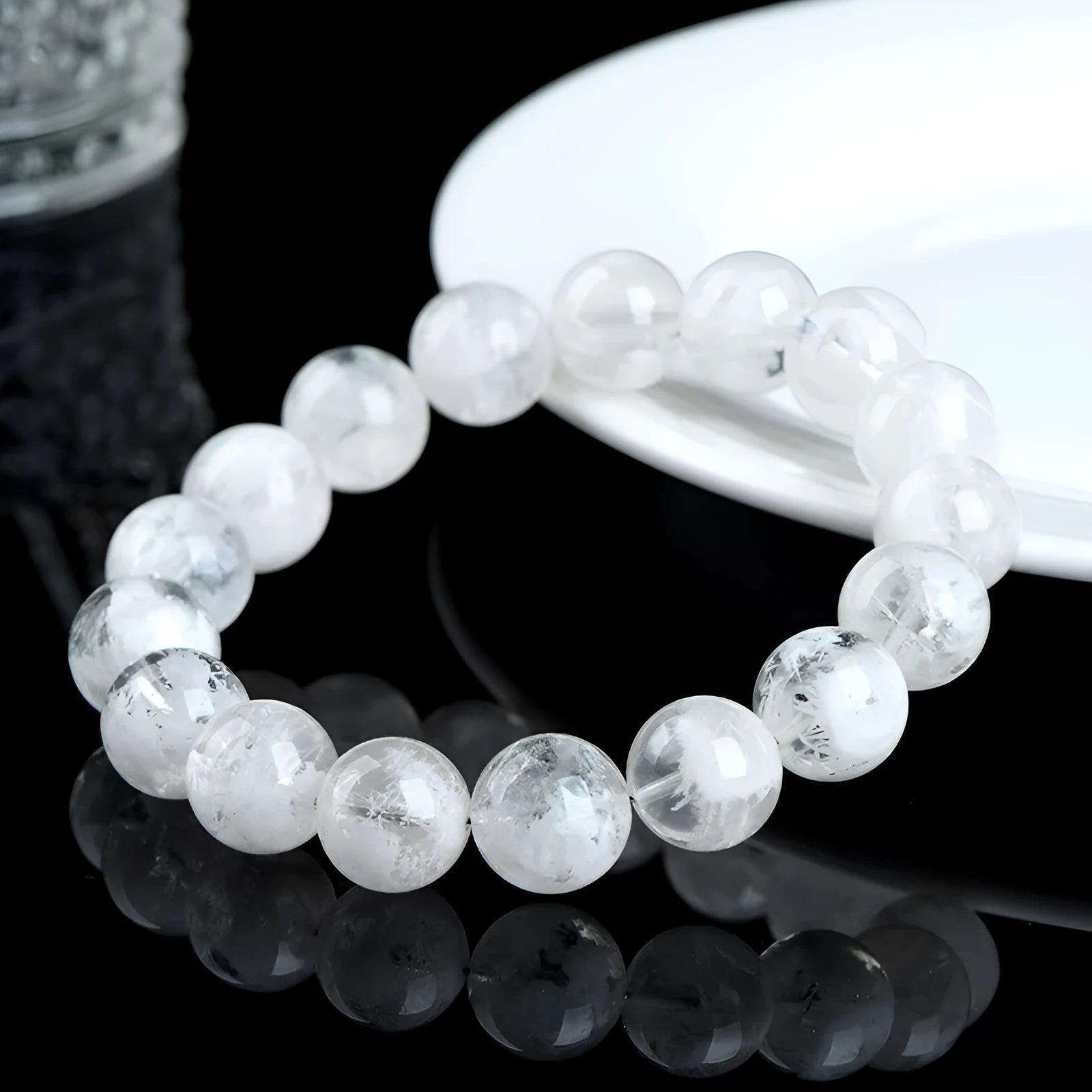 Women's crystal bracelet with blizzard snowflake round beads and Ruyi design in geometric shape.