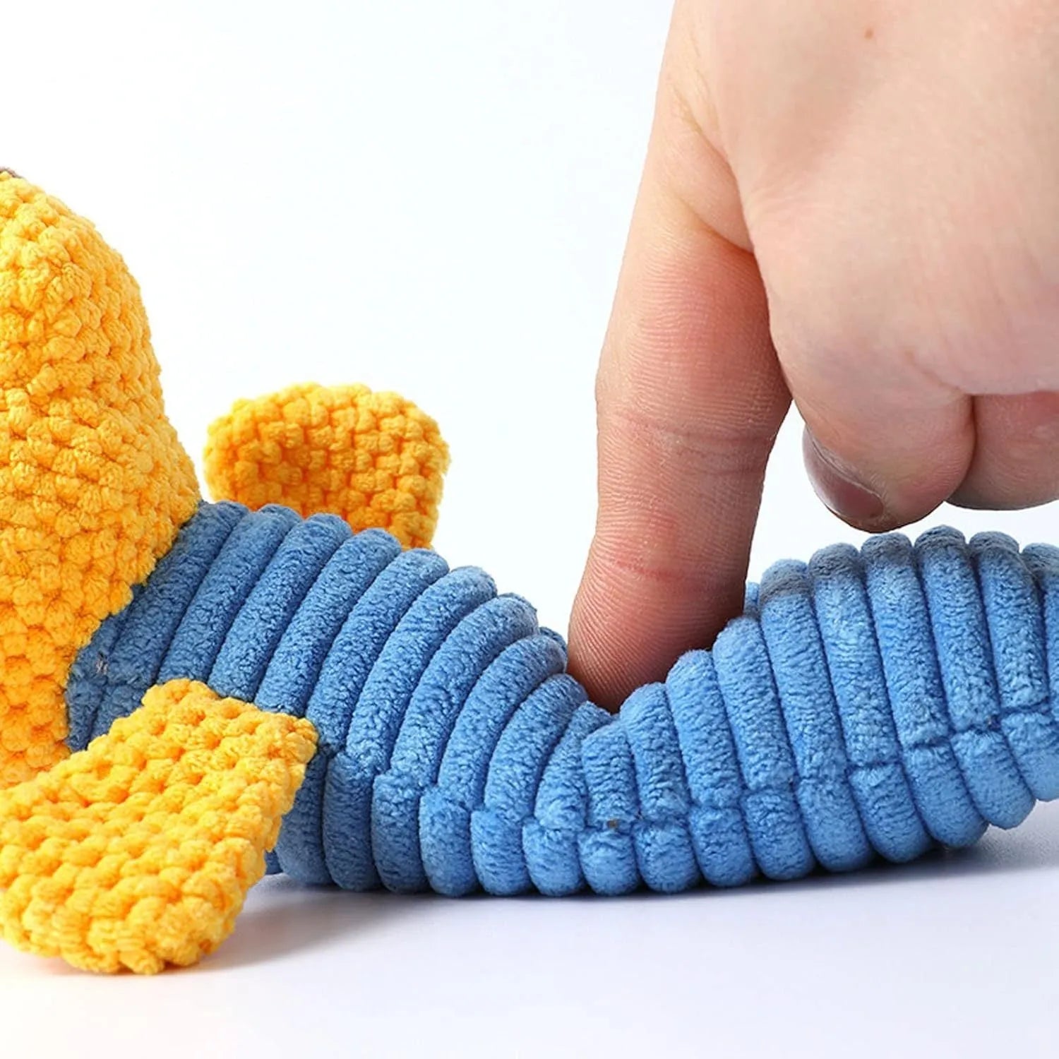 Soft cloth and polyester fibre squeaky stuffed dog chew toy, shown in calf, frog, or puppy shape, measuring 19cm long.