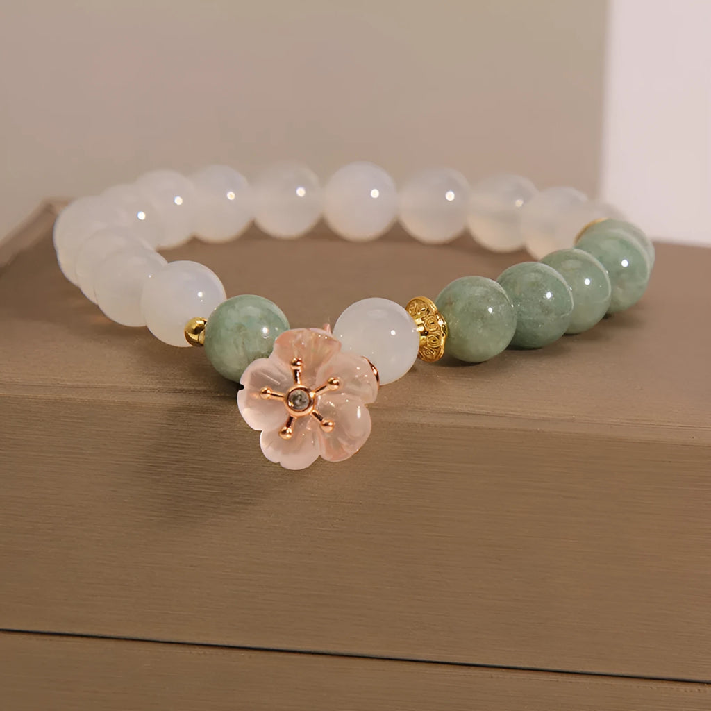 White agate and jade flower bracelet with pink accents on adjustable band