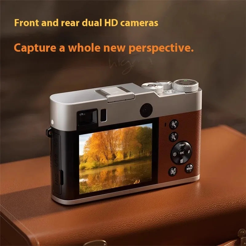 Black 5K digital camera with dual lenses and an optical viewfinder on a 2.88-inch screen.