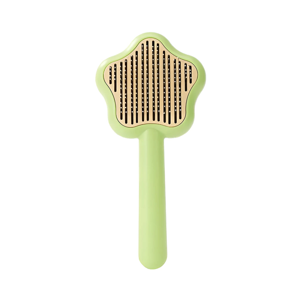 Magic Wand self-cleaning pet comb with stainless steel teeth in green colour
