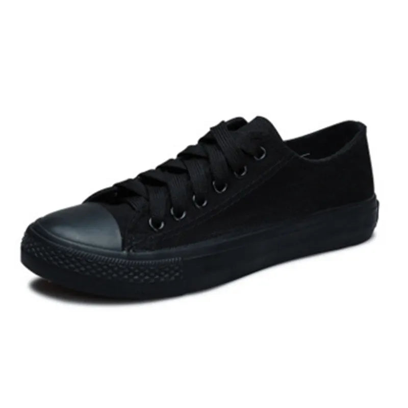 Women's solid colour canvas casual shoes shown in black, white black, white red, and all black.