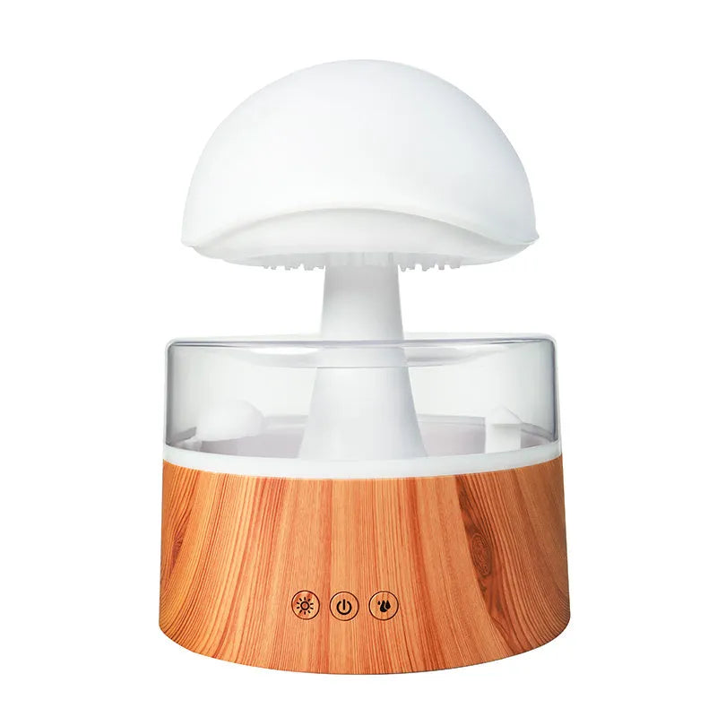 White cloud-shaped humidifier with simulated falling raindrops and coloured LED lighting