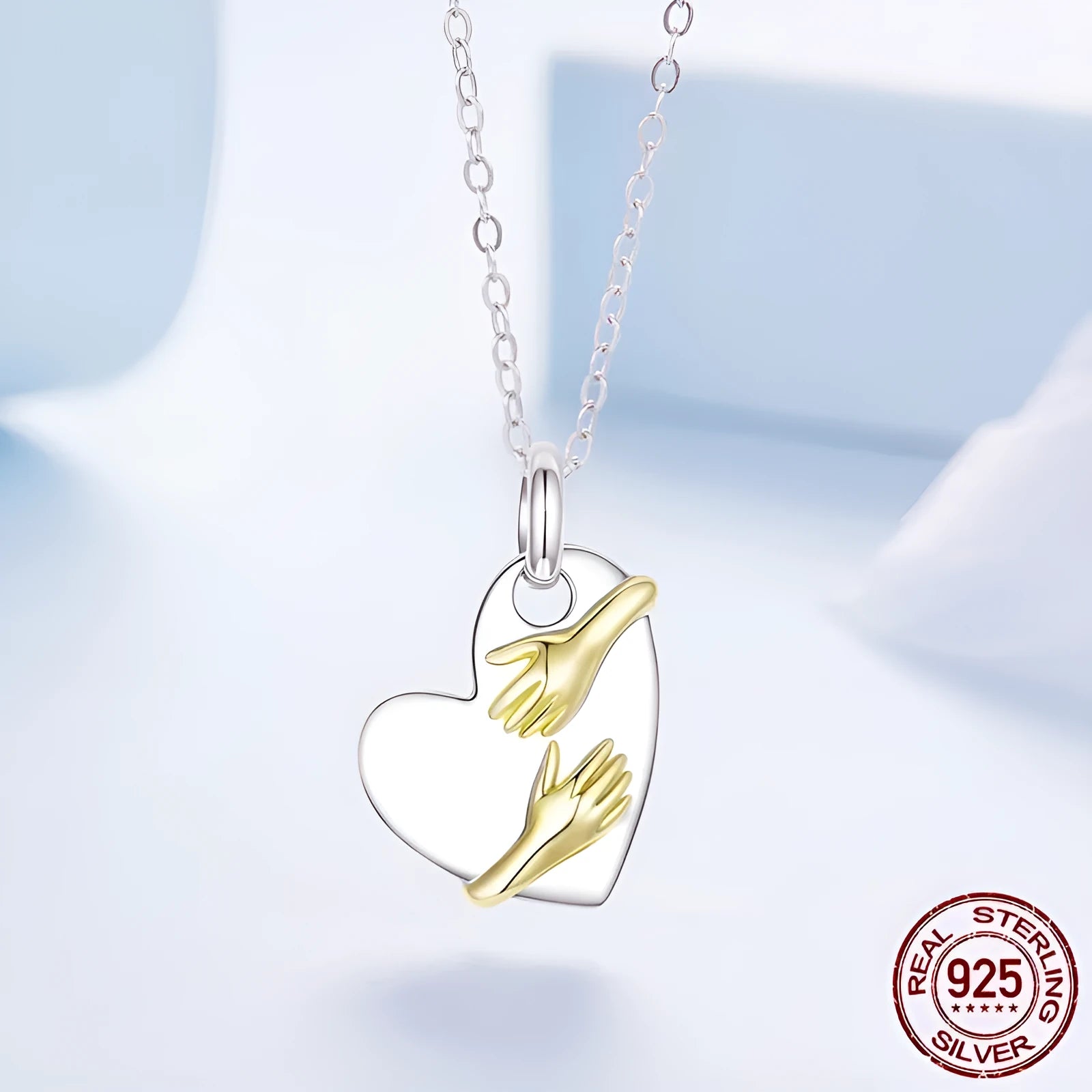 Original Hug Love 925 sterling silver heart necklace with adjustable O-ring chain on white background