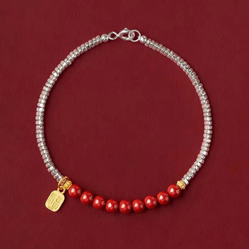 Silver electroplated copper lucky beads bracelet with geometric round beads on wrist