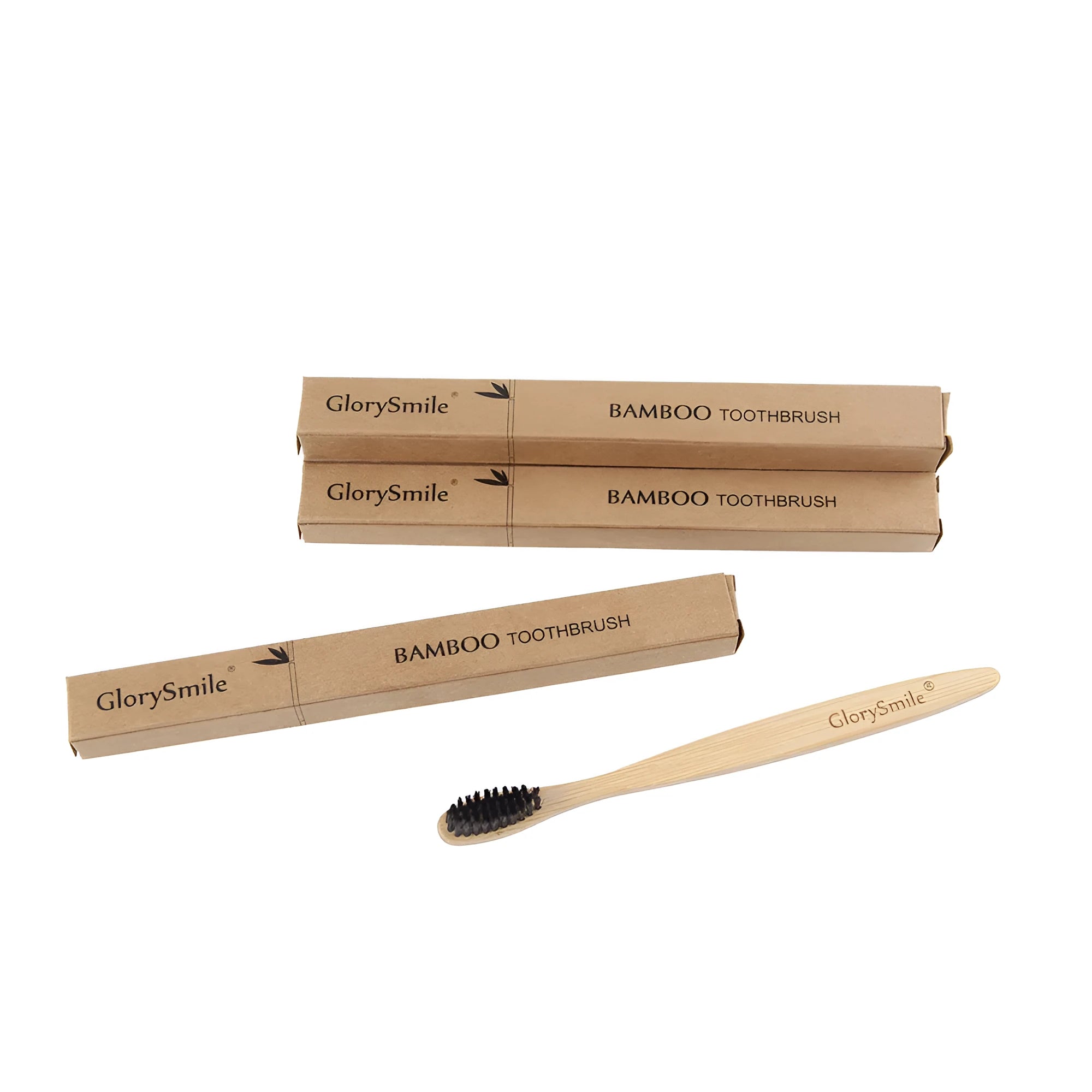 Natural pure bamboo toothbrush with black charcoal-infused bristles on a light background