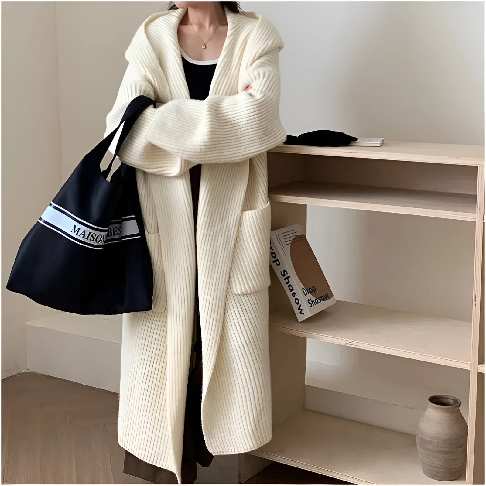 Loose grey hooded cardigan coat for women with raglan sleeves, shown open as an oversized layer.