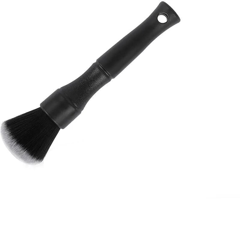 Black car detailing brush with ultra-soft pig hair bristles in two size options for gentle interior cleaning
