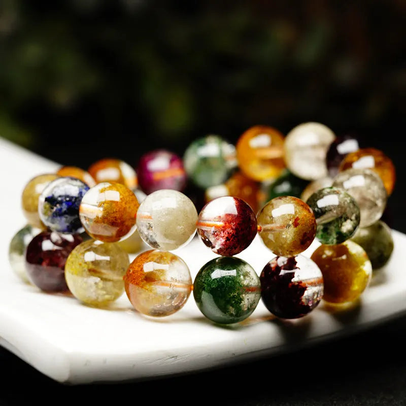 Colourful crystal bracelet with 10mm ball beads showing ghost cornucopia design in ethnic style