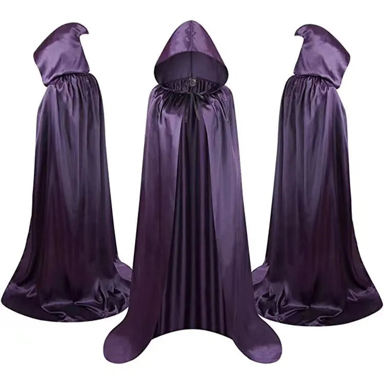 A black satin hooded cloak for children, laid flat to show its length, for Halloween wizard or witch costumes.