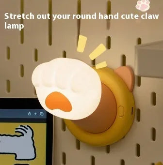White cat paw shaped rechargeable touch control bedside lamp with dimmable light.