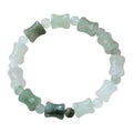 Korean style beaded bracelet with diamond shaped chalcedony and coconut shell beads on an elastic cord.