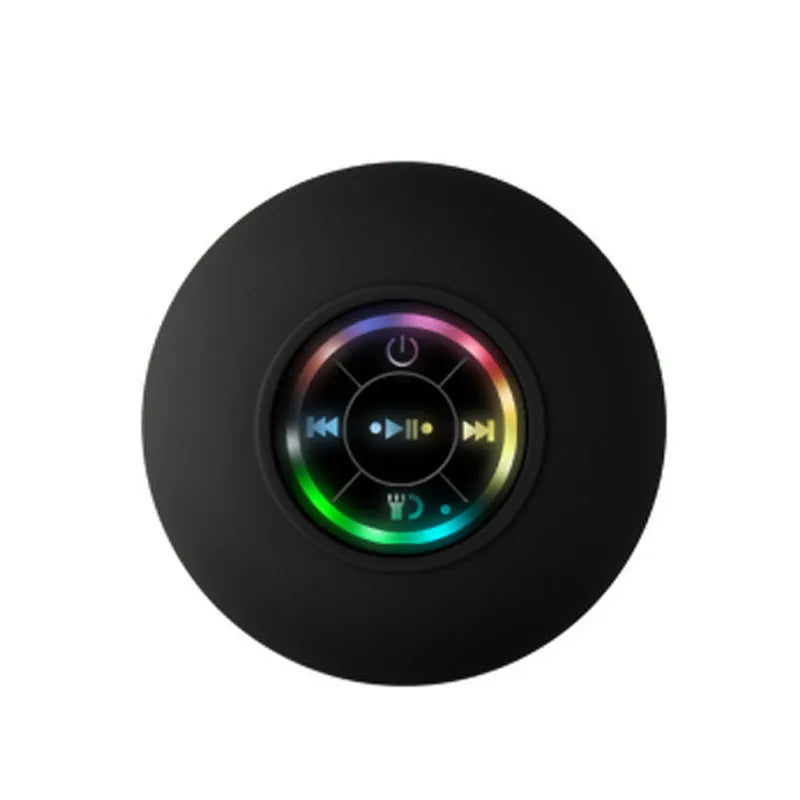 Large white waterproof Bluetooth speaker with a suction cup base and built-in LED light