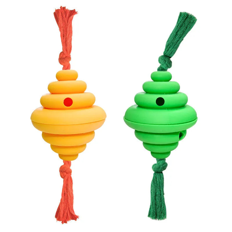 Green and yellow dog ball with rope attachment, showing treat-dispensing hole.