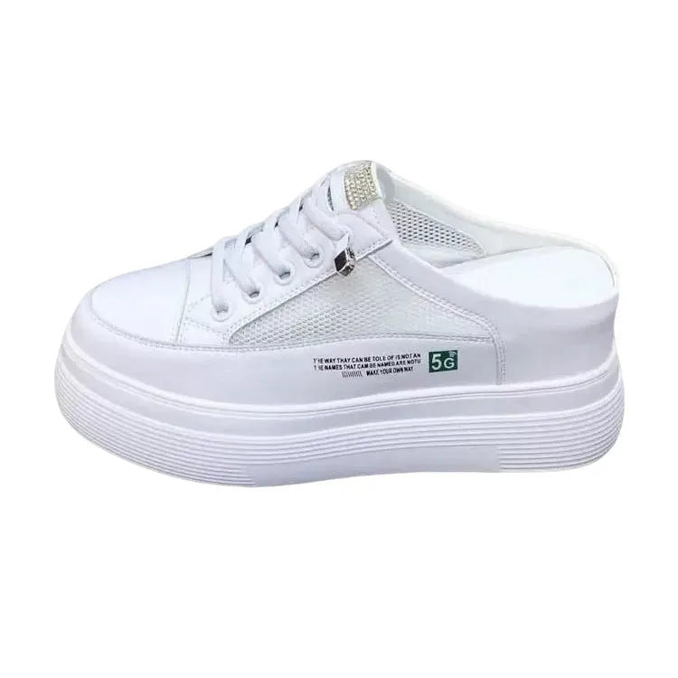 Women's white platform shoes with mesh surface detail and rounded toe