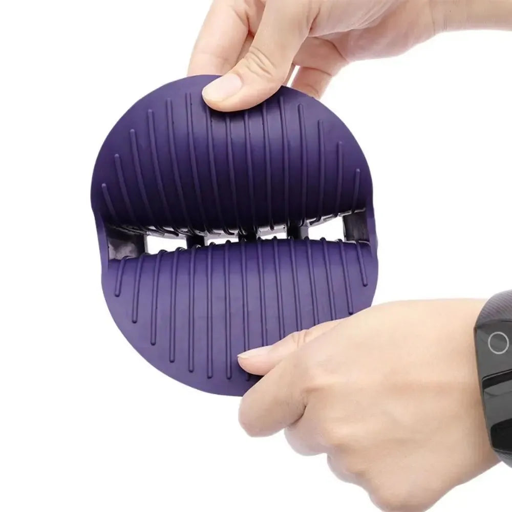Purple dual-sided pet shampoo massage brush with soft TPR bristles and ergonomic handle.