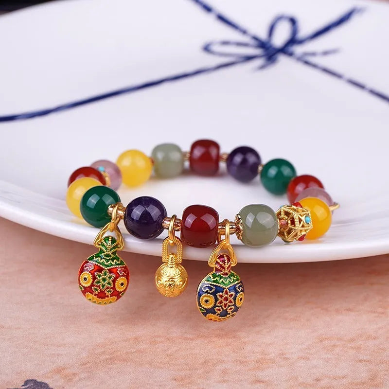 Swallowing gold beast motif agate and Hetian jade crystal bracelet with hand-woven 10mm beads